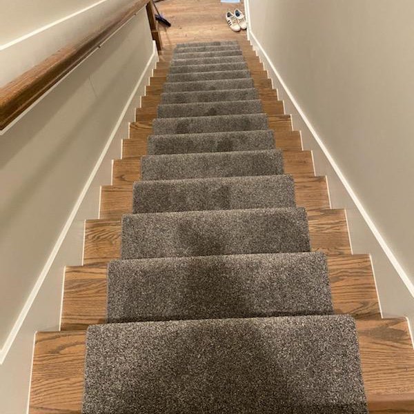 Refinished Hardwood Stairs, Carpet Runner and LVP Lower Level Flooring in Raleigh, NC
