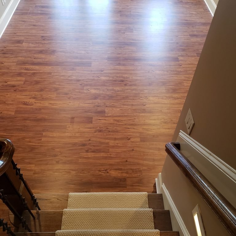 Walk Out Basement Coretec LVP Installation in Raleigh, NC
